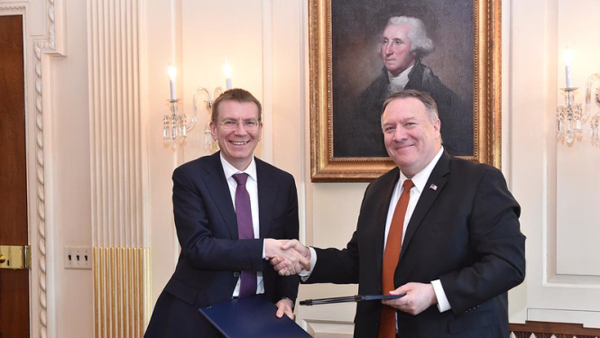 The Latvian Foreign Minister Edgars Rinkēvičs, and the United States Secretary of State, Mike Pompeo, sign a United States-Latvia Joint Declaration on 5G Security
